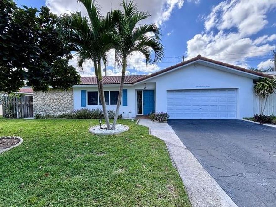 Welcome to this beautifully updated residence located in the prestigious community of University Park in East Boca Raton. This spacious home features 4 bedrooms, 2 bathrooms, and a thoughtfully designed open floor plan perfect for modern living. The kitchen boasts granite countertops, stainless steel appliances, and ample cabinet space. Enjoy a bright and airy living area with high ceilings and large windows that bring in natural light. The generously sized primary suite includes a walk-in closet and a spa-like bathroom. Step outside to a private backyard oasis with a covered patio—ideal for entertaining. Centrally located near FAU, Boca Raton Regional Hospital, Mizner Park, beaches, and top-rated schools. No HOA. Schedule your private showing today!