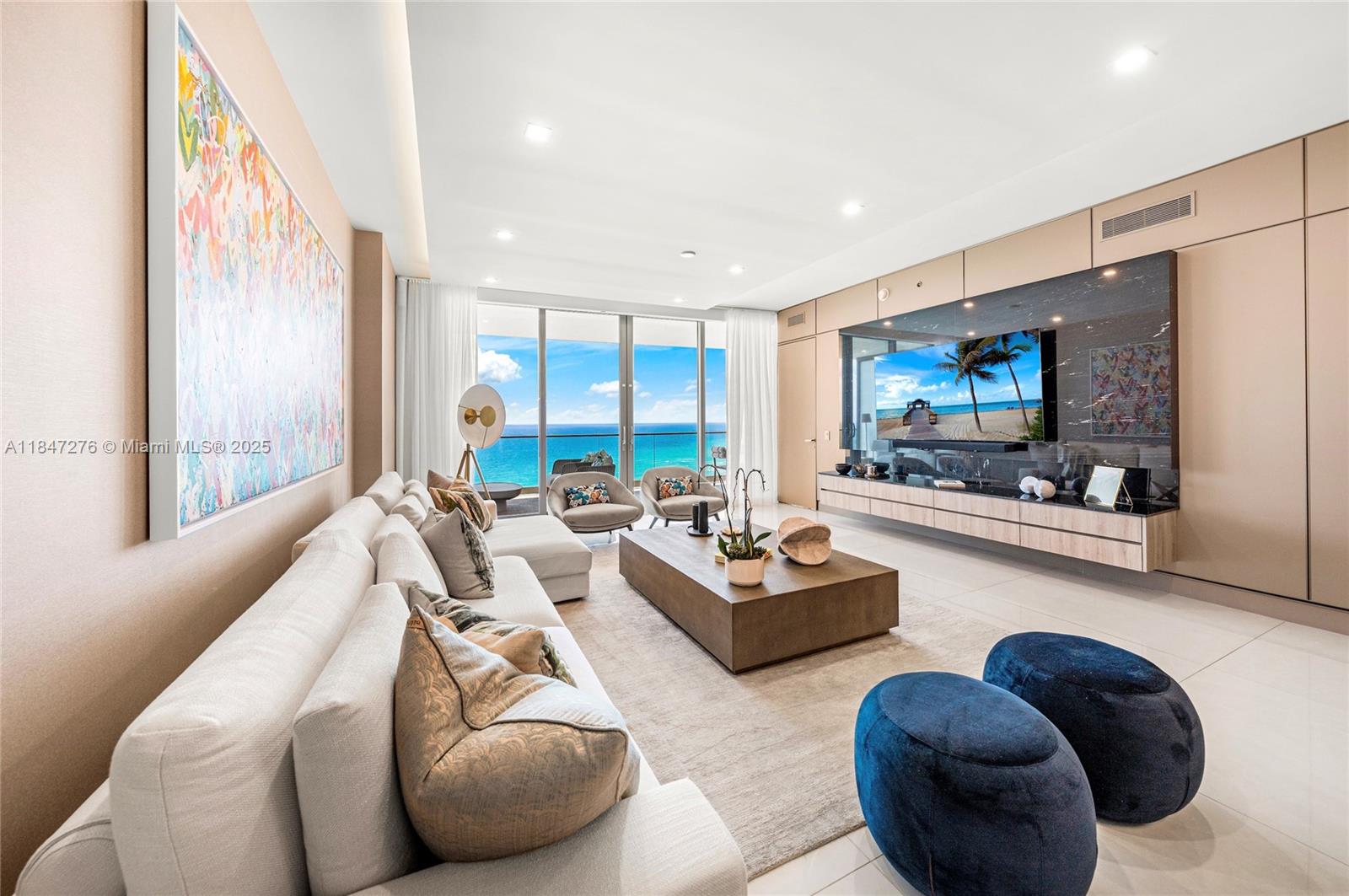 Brand new, fully upgraded residence. Flow-thru unit with 2 extensive terraces, one facing the ocean / white sand, the 2nd is facing the canal, city skyline / sunset. Designed by prestigious Design firm in an elegant, modern, flawless style. Wooden panels throughout, TV console in stone, larger floor tiles, personalized furniture for master bed, living room and guest suites. Top of the line appliances, Armani Casa kitchen & bathroom fixtures. Italian furniture. Costumized closets with lightning. Dropped ceiling. Ready to be occupied this impressive turn-key fully decorated oceanfront condo. Price includes everything except 2 art pieces (as value is considerably high), can be negotiated. Foyer also is upgraded/finished.
3 full beds, Studio can be turned into a 4th bedroom with a Jack/Jill.