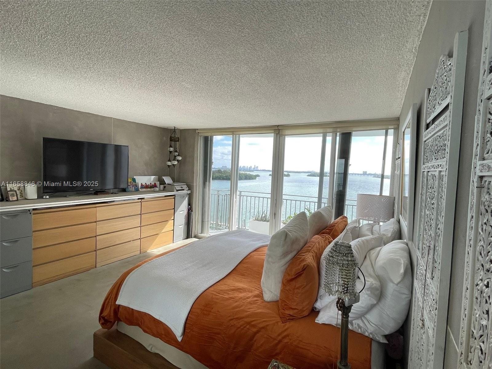 Discover waterfront living in this beautifully renovated 1 bedroom apartment in Miami. With 1042 soft of space, enjoy stunning water views from your own slice paradise. This secure building offers assigned parking, and a gym for your convenience. Nestled among lush trees, the property boast a marina and serene common areas. Experience the perfect blend of urban life and natural beauty.