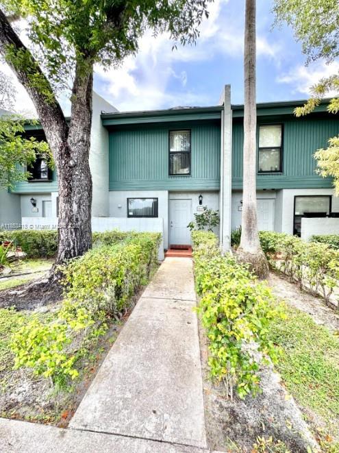 Townhouse in Pembroke Pines with 2 bedrooms, 2.5 bathrooms, and 2 assigned parking spaces right out front. Both bedrooms are upstairs with private bathrooms. Downstairs has a half bath for guests. The kitchen has newer Samsung appliances and hurricane impact windows. Bedrooms also have impact windows, plus accordion shutters for the sliding doors. New central AC installed July 2025. HOA is $563/month and includes lawn care, exterior paint, pool, racquet court, and dog park. Great for first-time buyers, small families, or anyone looking for a move-in ready home near schools, shops, and highways.