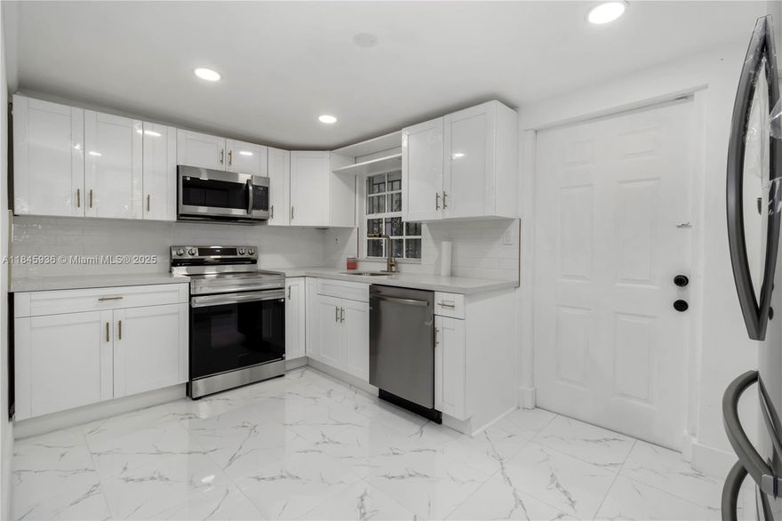 Fully updated single-family home offering 3 bedrooms and 3 full bathrooms. Flexible layout allows use as a 2/2 main home plus a 1/1 in-law suite with private entrance – perfect for extended family or rental income. Upgrades include a brand-new kitchen with modern cabinets and stainless steel appliances, updated bathrooms, new flooring throughout, and fresh interior and exterior paint with a sleek, modern touch. Enjoy central A/C, a spacious backyard, and a covered patio—ideal for outdoor living and entertaining. Centrally located in a quiet Miramar neighborhood, close to schools, parks, and major highways. Move-in ready with great income potential!