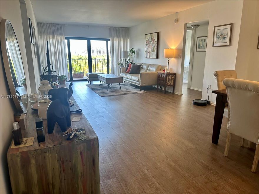 Do not miss out on this remodeled 2 bedroom, 2 bathroom split plan unit with a great open view. This unit features over 1,300sqft, lots of natural light, engineered wood floors throughout, modern kitchen, stainless steel appliances, quartz countertops, recess lightning, and ample closet space. The Key Biscayne Ambassador is centrally located on Key Biscayne. Walking distance to the beach, grocery store, restaurants, shops, schools, community center & park. Building features laundry facilities on every floor, community room, party room, gym, sauna, heated pool, bbq area, golf cart charging area, bicycle storage, storage room, on-site manager, 2 covered and assigned parking spaces & guest parking. MUST SEE!