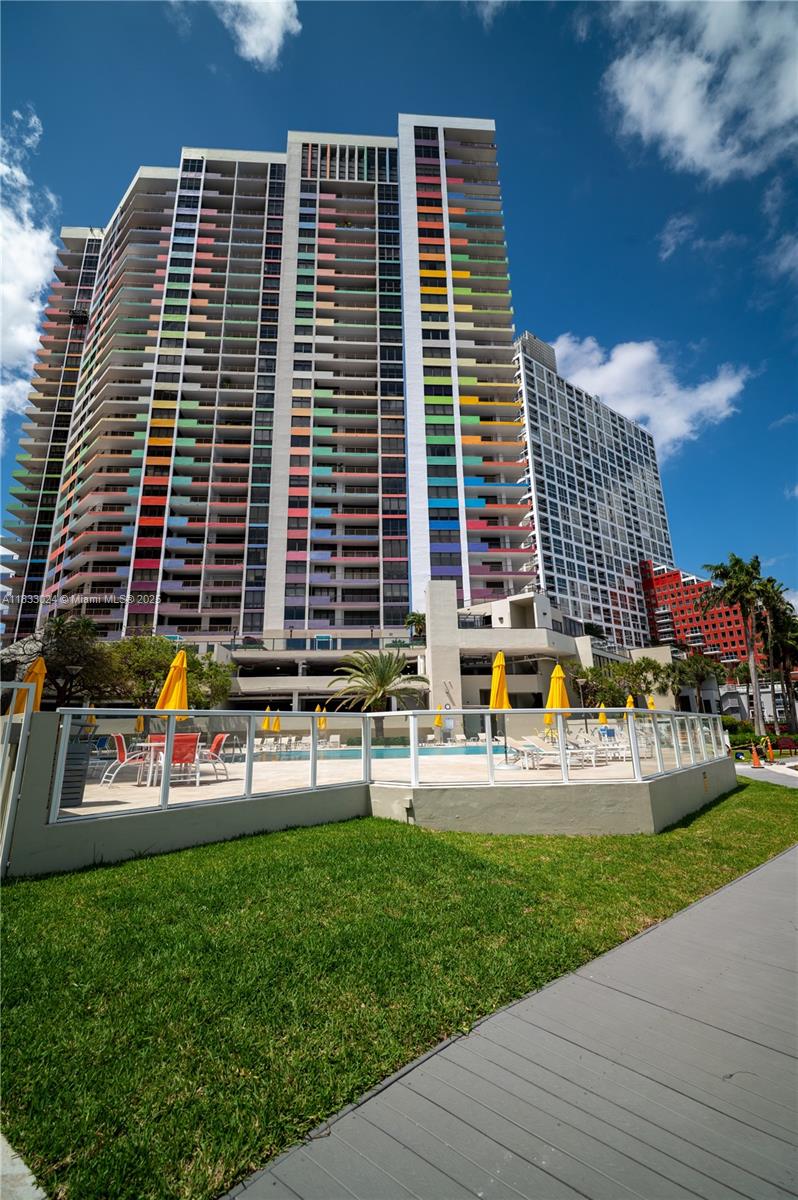 This beautifully converted studio offers a spacious 1-bedroom, 1-bath layout with an ample bathroom and in-unit washer and dryer for added convenience. Located in the prestigious Brickell area, the apartment comes with one covered parking space and partial bay view that showcase the stanning skyline. The expansive balcony is perfect for entertaining or simply unwinding while enjoying breathtaking moonrises and sunsets. The unit offers updated and open plan kitchen with S/S appliances, wood floors and marble bath, hurricane impact doors, custom made walk-in closet. The building features top-tier amenities including bayfront pool, state-of-the-art gym, sauna, steam rooms, BBQ area, party salon, children playroom and much more. Building recently passed 40-year certification. Dogs are OK.