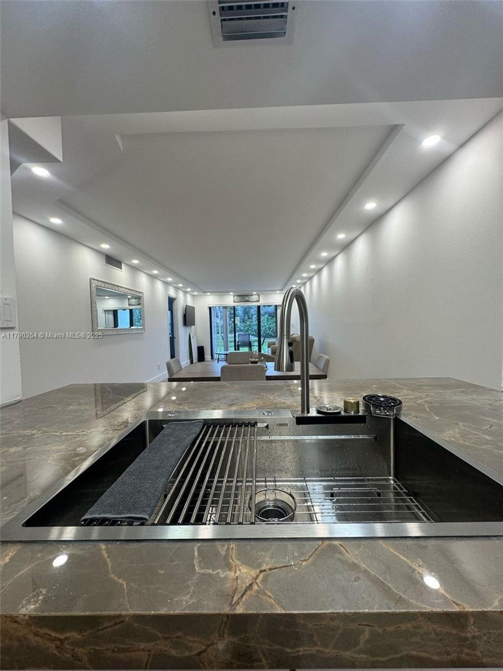 Photo of 10044 S Ocean Dr #105, Jensen Beach, FL 34957 (MLS # A11790354)