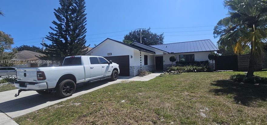 Highly desirable 3BR/2BA pool home located in the heart of Deerfield Beach. This 1985-built residence has been thoughtfully updated, including a modern kitchen with energy-efficient appliances and a dedicated laundry room with high-capacity machines. Exterior highlights include a private screened pool, beautiful landscaping, and a fully fenced yard Security is prioritized with impact-resistant windows and new modern roof instaled 2025. Enjoy proximity to local amenities and the serene Quiet Waters Park. Perfect for families or those seeking a move-in-ready property with no homeowner association restrictions.