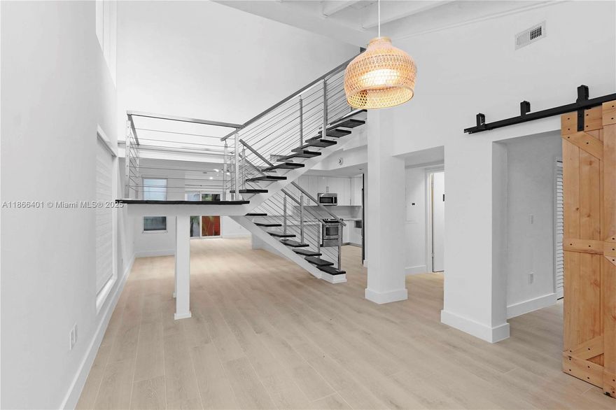 This reimagined California contemporary offers 4 bedrooms, 2.5 baths, and a versatile layout with three bedrooms upstairs and a guest suite on the main level. Expansive windows highlight vaulted, wood-beamed ceilings, open living and dining areas, and a striking floating staircase. Updates include impact windows/doors, a sleek chef’s kitchen, new flooring, spa-inspired primary bath, and custom walk-in closet. Detached parking for 2–3 vehicles. Prime location near CocoWalk, cafés, boutiques, parks, and minutes from Brickell, Coral Gables, and Key Biscayne. Enjoy tranquil Grove living with city convenience. Credit check, police report, and 24-hr notice required.