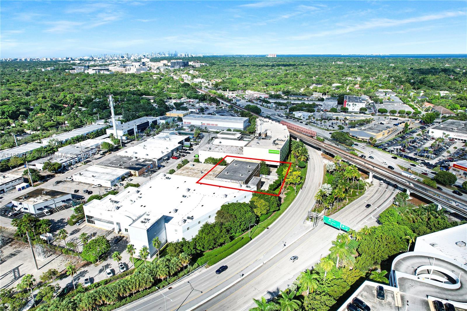 Single-user warehouse featuring 32' clear height and a clear-span layout with no interior columns and a large mezzanine. Includes one covered, dock-high loading door and one overhead drive-in door. Equipped with 3-phase power and two installed 3.2-ton cranes with hoists. On-site parking for up to 9 vehicles with 6 spaces inside a gated area. The detached 1,500 sf office area offers a private office with a full bathroom and kitchenette, large secondary office space, large open reception area and one additional half bathroom.