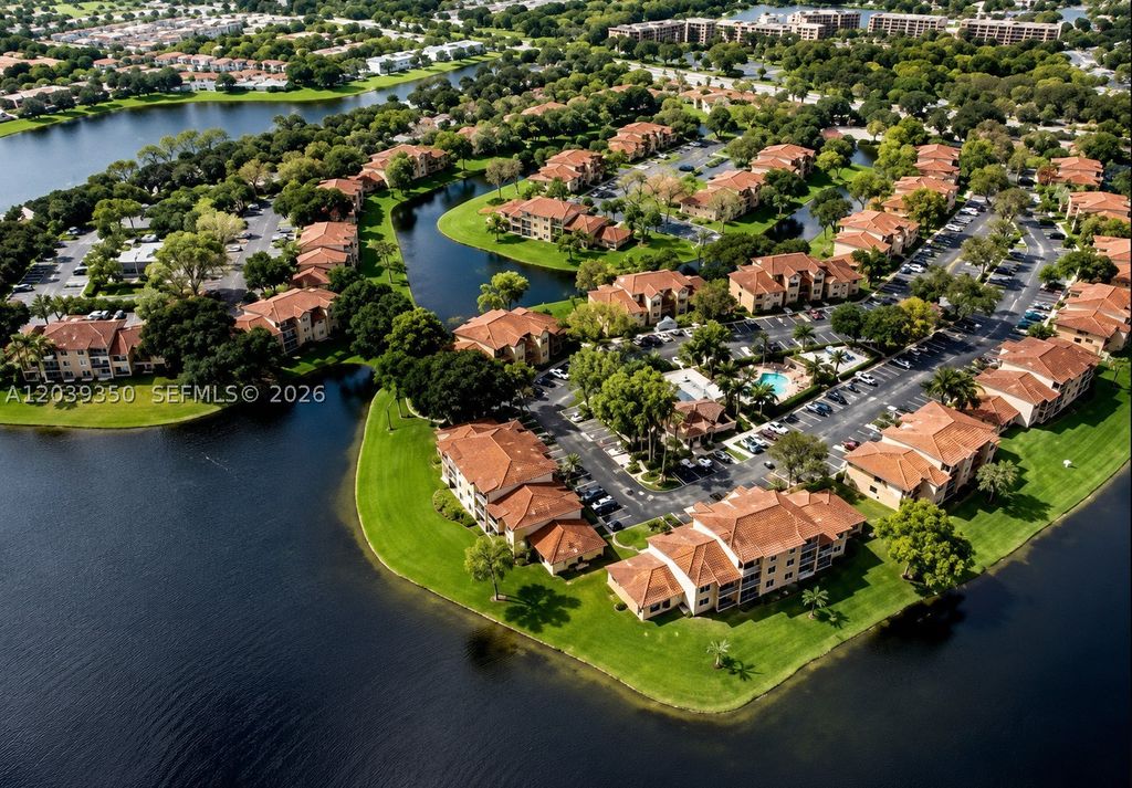 Photo of 9953 NW Nob Hill Pl #9953, Sunrise, FL 33351 (MLS # A12039350)