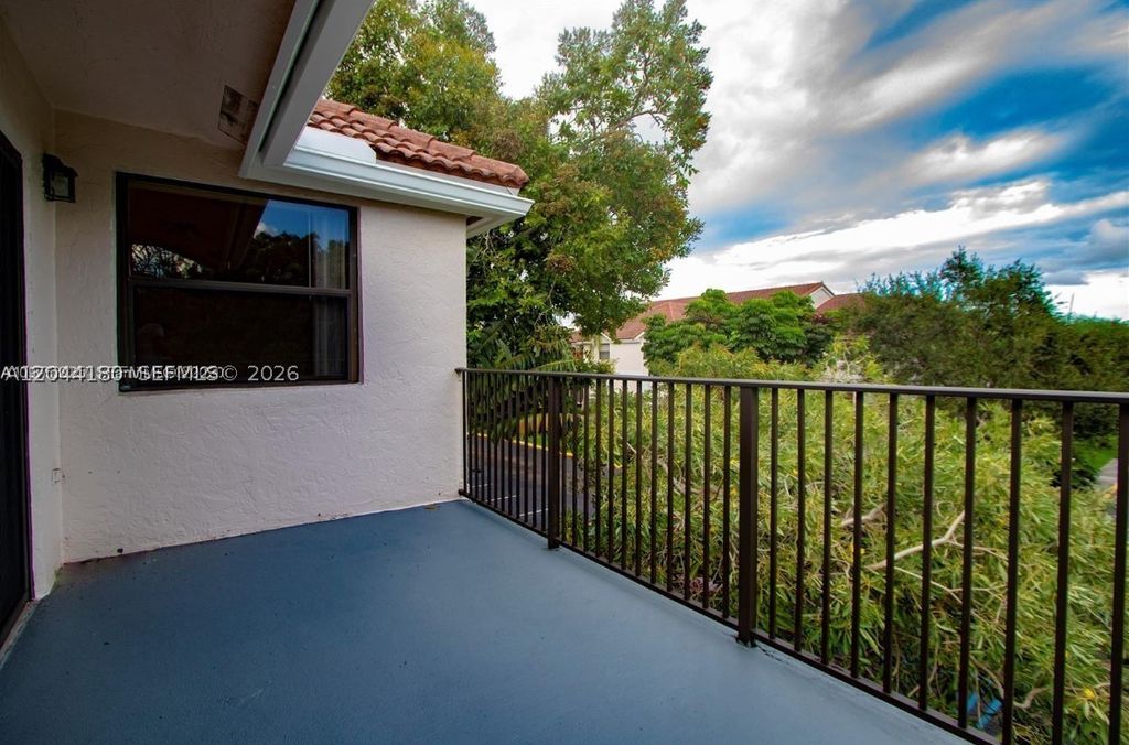 Photo of 10105 W Sunrise Blvd #303, Plantation, FL 33322 (MLS # A12044180)