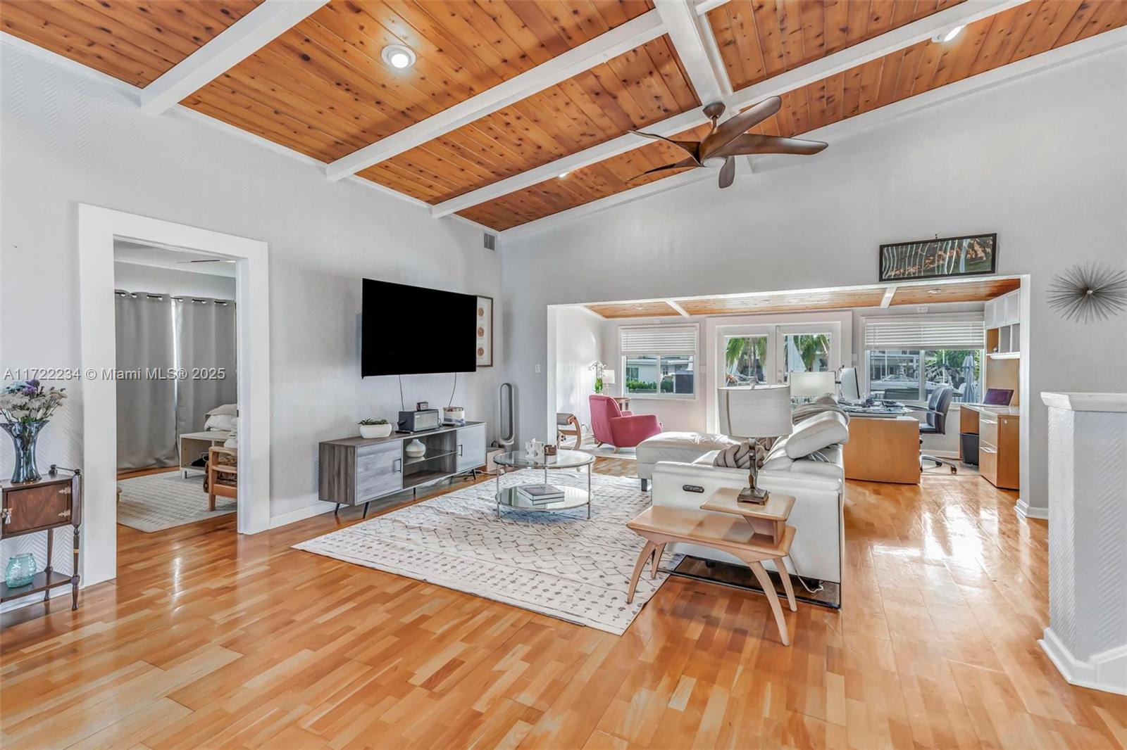 Discover the ultimate waterfront lifestyle in this Lauderdale Isles home, perfect for boating enthusiasts! With 70 feet of water frontage, a deep-water dock with ocean access, and NO FIXED BRIDGES, enjoy effortless trips to the New River or Bimini. The unique pool placement allows for both a yard and a private pool/BBQ area—ideal for entertaining. Recent updates include a new roof (2019), impact windows/doors (2018), water heater (2020), and pool motor (2020). The updated kitchen features a stylish backsplash, and the home offers vaulted ceilings, two A/C units, and a bright, airy feel. Minutes from I-95, 595, and Fort Lauderdale nightlife—by boat or car! Move-in ready and impeccably maintained. Schedule your private showing today!
