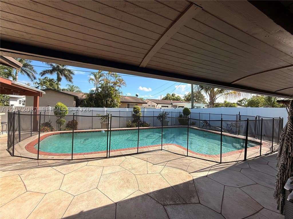 Photo of 11450 NW 30th Pl, Sunrise, FL 33323 (MLS # A12072027)