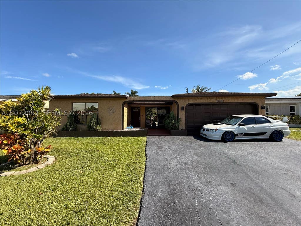 Photo of 11450 NW 30th Pl, Sunrise, FL 33323 (MLS # A12072027)