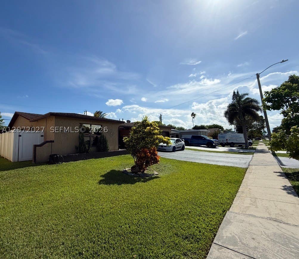 Photo of 11450 NW 30th Pl, Sunrise, FL 33323 (MLS # A12072027)