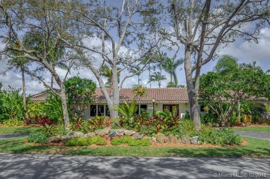 Turn-key 5 BR/3.5 bath home in the desirable Pine Bay Estates neighborhood of Coral Gables.  Foyer entrance leads to relaxed Florida living with a formal flair.  Generous entertainment areas w/ large covered patio & pool deck surrounded by lush tropical landscaping. Kitchen has granite counters, large island & upgraded appliances.  Spa-like ambiance continues in the master bedroom suite w/ sitting area, interior gardens, & large domed skylight. Also has impact window/doors, 2-car garage, and office.