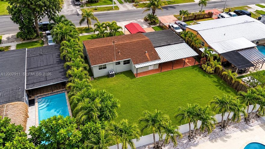 Move-in ready 3-bedroom, 2-bathroom home on an oversized 7,500 sq ft lot in Hialeah. This well-maintained property offers a functional layout with comfortable living spaces and plenty of natural light throughout. The expansive yard provides excellent potential for future additions, parking for multiple vehicles, or outdoor customization. Home is being sold with all kitchen appliances, plus washer and dryer for added convenience. Centrally located near Goodlet Park, Hialeah Senior High School, and just minutes from Downtown Doral, with quick access to major highways, shopping, and dining.