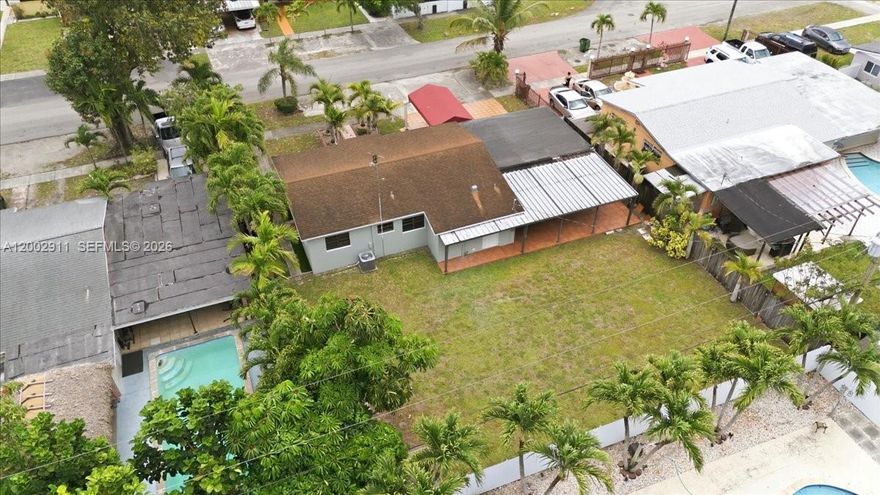 Move-in ready 3-bedroom, 2-bathroom home on an oversized 7,500 sq ft lot in Hialeah. This well-maintained property offers a functional layout with comfortable living spaces and plenty of natural light throughout. The expansive yard provides excellent potential for future additions, parking for multiple vehicles, or outdoor customization. Home is being sold with all kitchen appliances, plus washer and dryer for added convenience. Centrally located near Goodlet Park, Hialeah Senior High School, and just minutes from Downtown Doral, with quick access to major highways, shopping, and dining.
