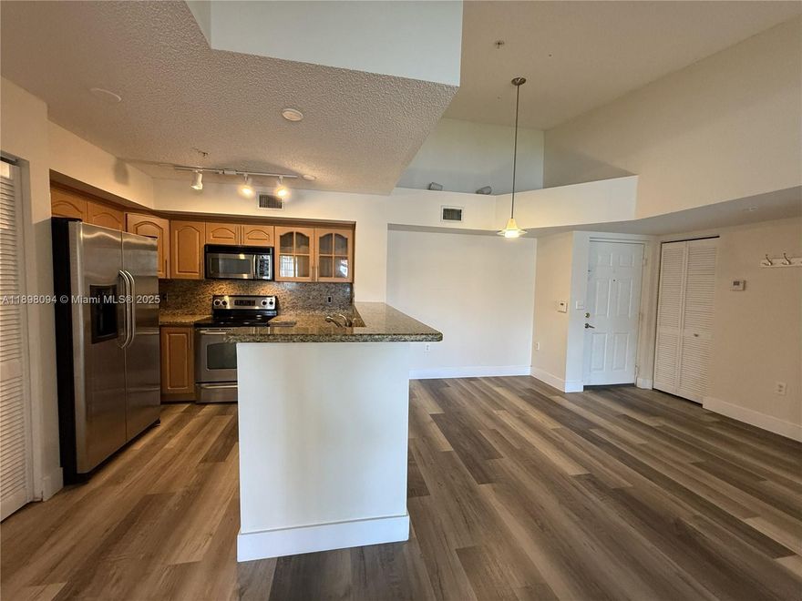ABSOLUTELY GORGEOUS CORNER UNIT WITH SEPARATE ENTRANCE AND AWESOME VIEW. THIS SPACIOUS 2 BEDROOM, 2 BATH CONDO OFFERS A BRIGHT OPEN LAYOUT WITH UPDATED VINYL FLOORING AND GRANITE COUNTERTOPS IN THE KITCHEN. ENJOY A RELAXING WATER VIEW FROM YOUR PRIVATE BALCONY. COMMUNITY FEATURES INCLUDE POOL, JACUZZI, PLAYGROUND, TENNIS, FITNESS CENTER, RACQUETBALL COURT, SECURITY GATED AND MUCH MORE. CONVENIENTLY LOCATED NEAR SHOPPING, DINING AND MAJOR HIGHWAYS. MOVE IN READY AND EASY TO SHOW!