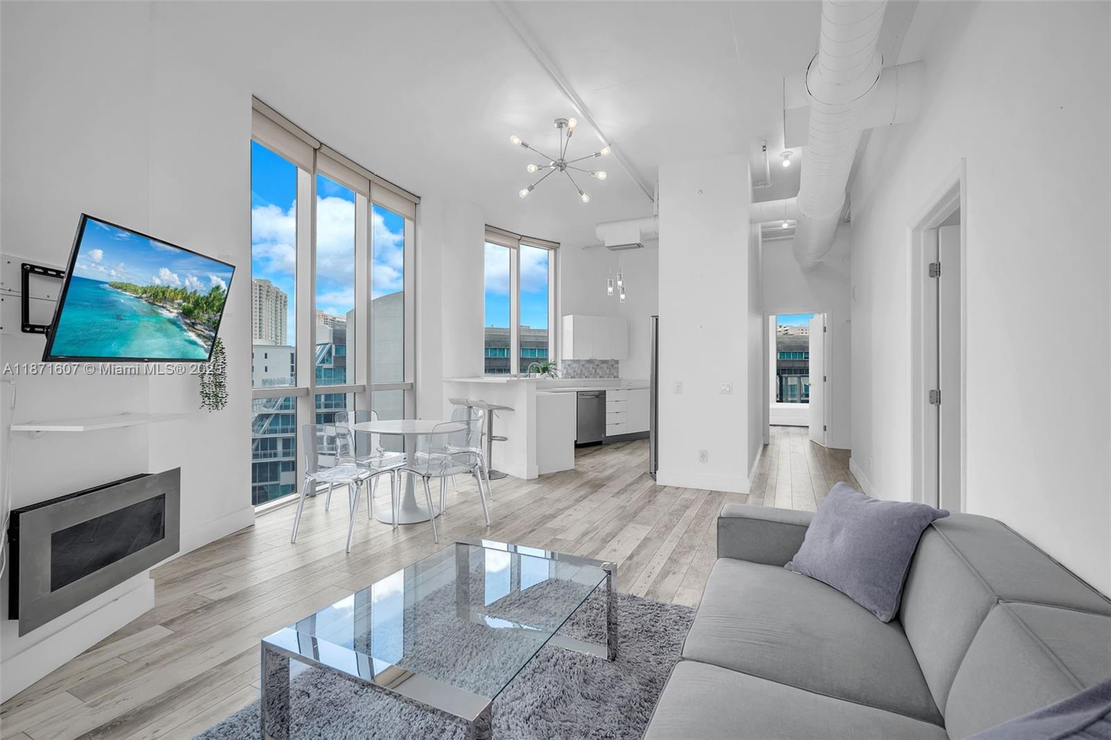 Welcome to this 3-bedroom 3-bath corner residence with two balconies. This modern loft boasts 11` high ceilings,cozy laminate flooring throughout,upgraded kitchen and flooded with natural light.The full-service building offers an impressive range of amenities:a heated pool,jacuzzi,state-of-the-art fitness center,sauna,steam room,tennis and basketball courts,business center,valet parking,24-hour security,private marina,community lounge.Pet-friendly with basic cable and high-speed internet included in the rent.Ideally situated in the heart of Aventura,just 5 minutes from the ocean and within walking distance to Aventura Mall, parks, playgrounds, grocery stores, and dining. Surrounded by top schools and daycares with quick access to I-95.