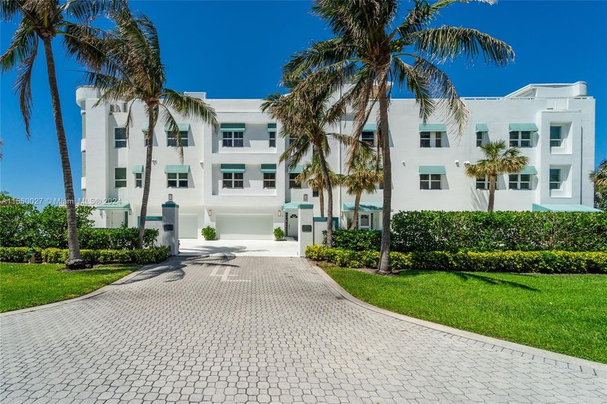 Exquisite (and hard to find) 3 story luxury townhome w/ massive rooftop terrace... ideal for entertaining. Spectacular Intracoastal (and ocean) views.  Intimate 4 unit building with deeded boat dock.  This 4Br /3.5Ba. includes a private elevator also, a 2-car garage.  The second floor is an open kitchen w/ oversized living area. Wide open views from every floor...  Small pets allowed.  All sizes, taxes, meas., HOA fees approx.