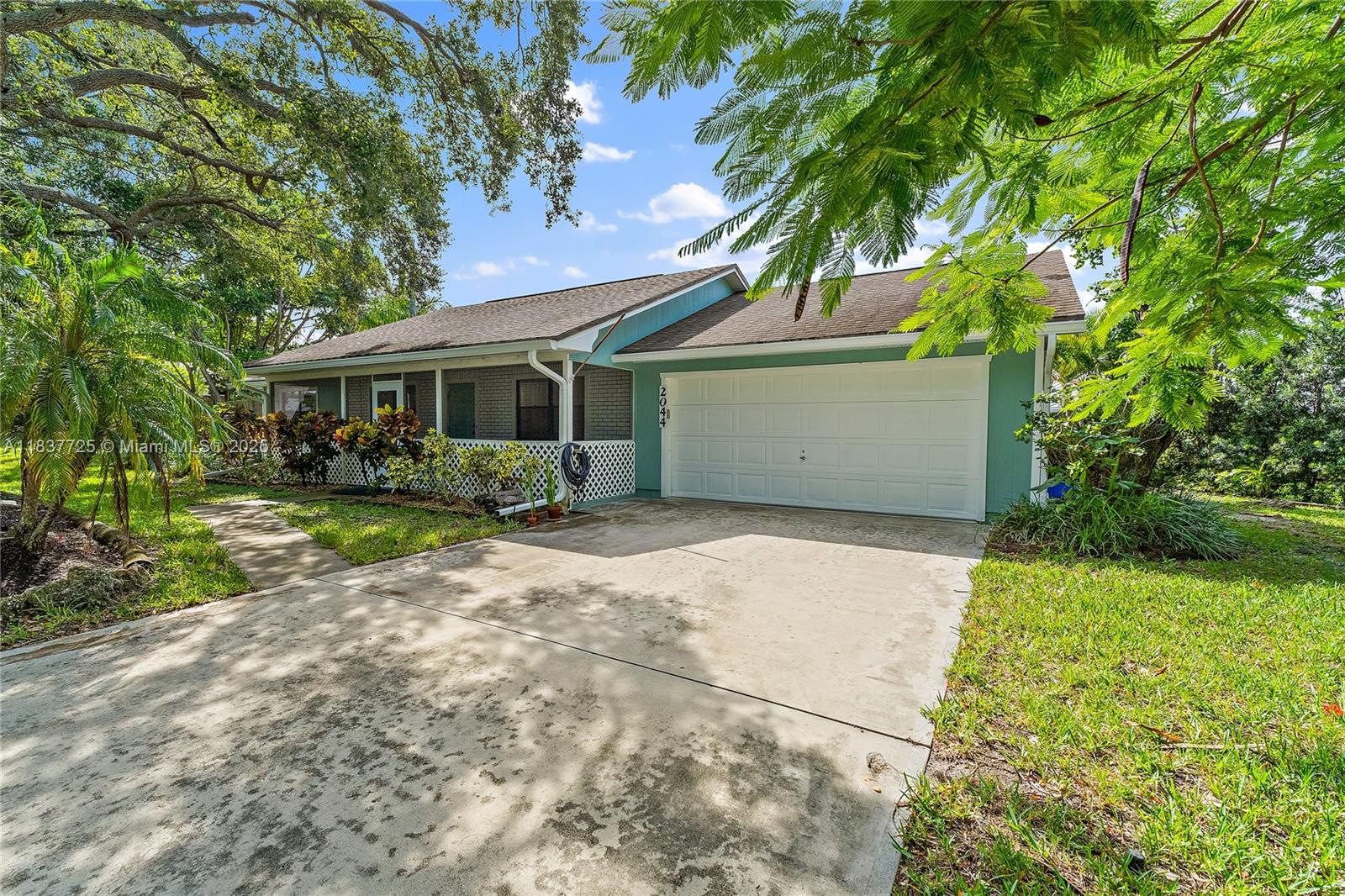 Welcome to the heart of Jensen Beach! Lush landscaping and beautiful mature trees surround this 3 bed/2 bath home. This home is offered partially furnished as seen in photos. Home features: open floor plan, vaulted ceiling, wood like floors throughout living area and master bedroom & a private fenced backyard. Great location close to beaches, shopping, restaurants & downtown Jensen. Pet welcome with owner approval.