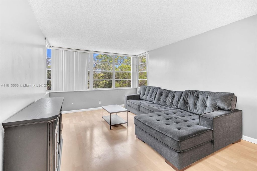 Photo of 6500 Cypress Rd #408, Plantation, FL 33317 (MLS # A11813565)