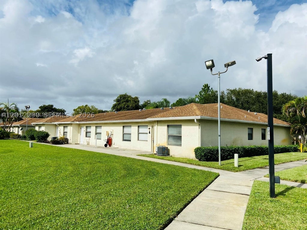 Photo of 5080 Sanctuary Way #A, West Palm Beach, FL 33417 (MLS # A12012290)