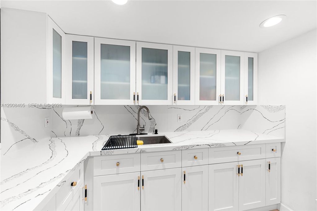 Photo of 6195 Rock Island Rd #503, Tamarac, FL 33319 (MLS # A12008405)