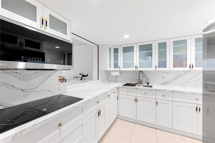 Remodeled 2 Bed 2 Bath unit with a balcony , washer and dryer hook up  in a great complex. Kitchen and kitchen appliances are all less than 2 years old. The unit comes with one assigned parking space but more spaces are available. Unit also includes a small storage closet.