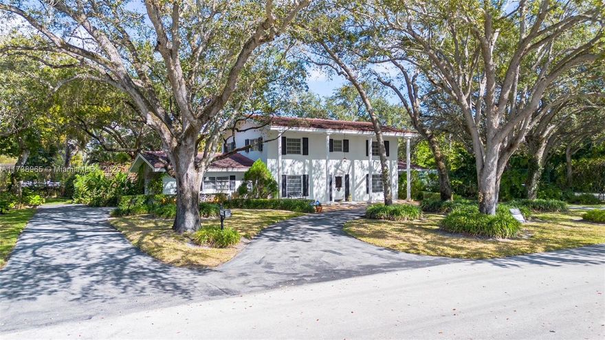 Charming two-story Colonial on a quiet street near Palmetto High! This 5BR/3BA home sits on a full acre and features a private tennis court and a screened-in pool patio. Inside, you”ll find spacious living areas, a classic layout, and plenty of potential to make it your own. One bedroom is conveniently located downstairs, perfect for guests or multi-generational living. The home needs some TLC but is priced at just $2.70M, making it an excellent opportunity in this sought-after location. Includes a two-car garage and ample driveway space. Don”t miss this rare chance to call today for a showing!