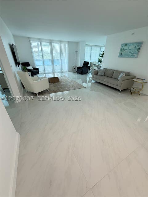 Photo of 3500 Mystic Pointe Dr #405, Aventura, FL 33180 (MLS # A12070807)