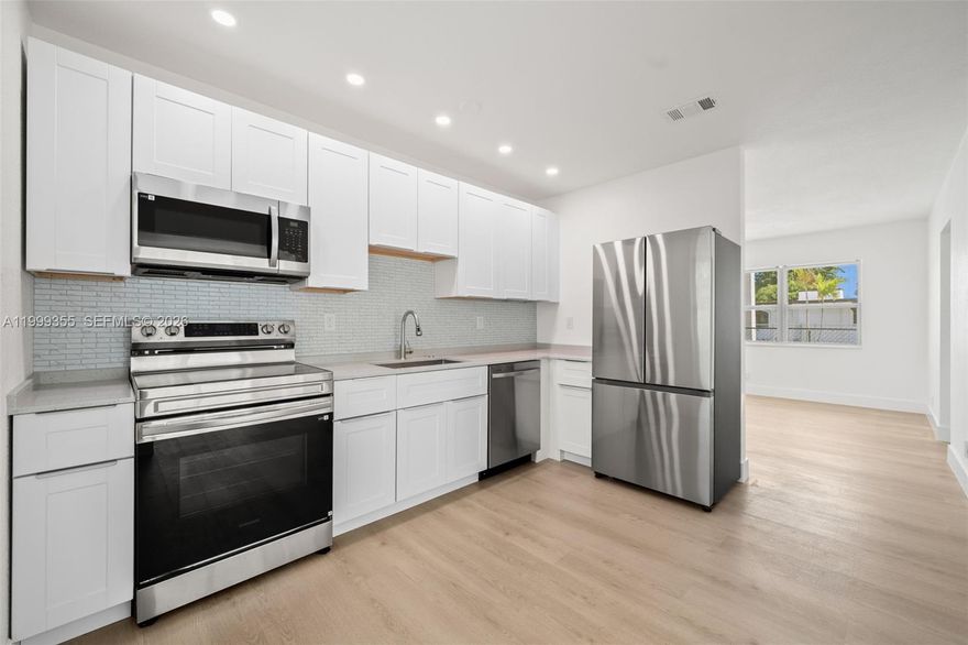 Beautifully renovated and move-in ready spacious home for a large and growing family. 4 bedrooms, 2 bathrooms and two separate living areas. The home has been fully updated with modern finishes, stylish kitchen and brand new appliances. Bright, open spaces and functional layout.
Corner unit with large and well maintained yard with mango trees.
Perfectly located to major highways.