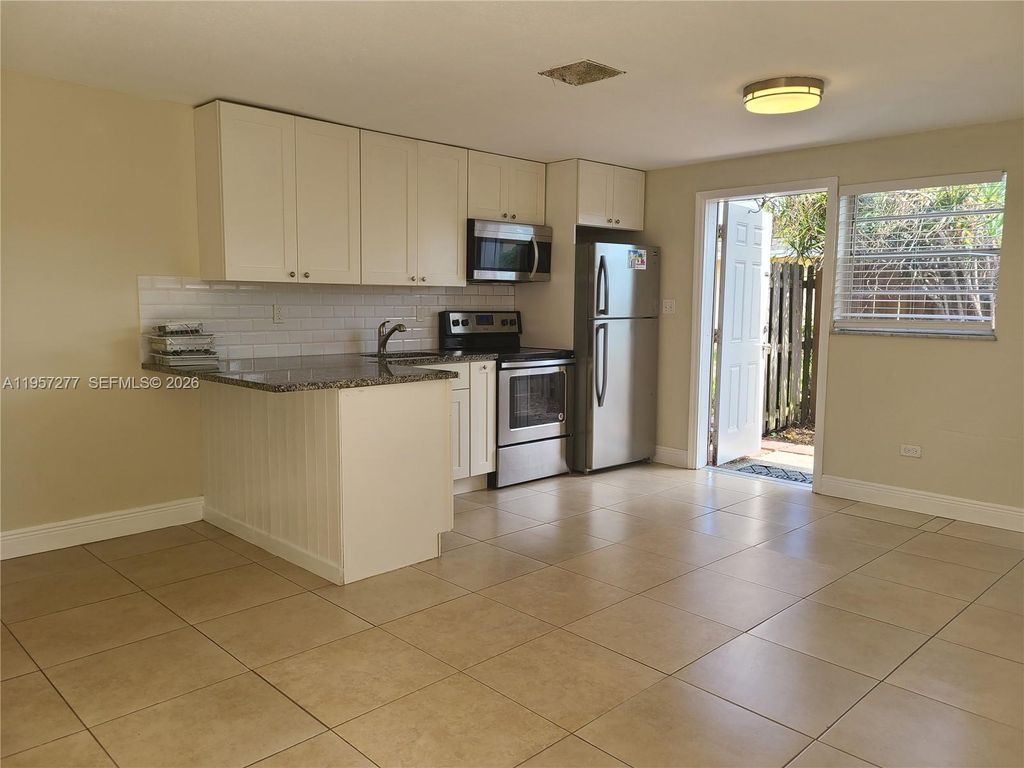 Photo of 127 NW 13th Ave #rear, Dania Beach, FL 33004 (MLS # A11957277)