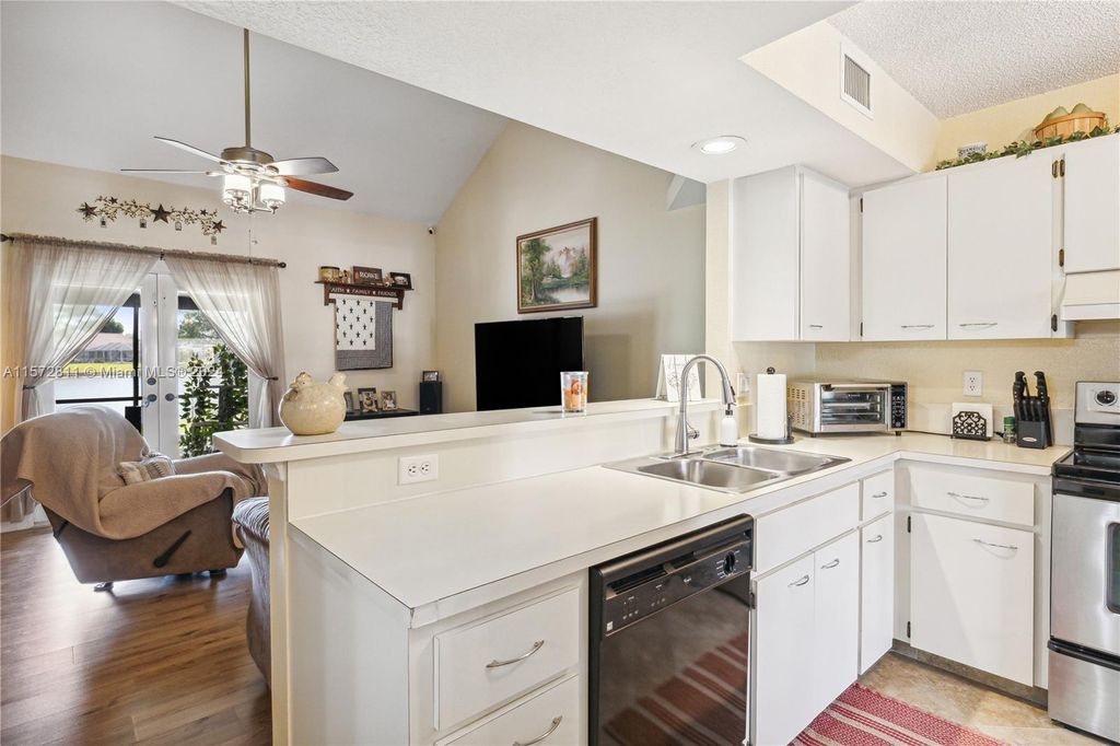 Photo of 18601 Woodstream Dr #18601, Boca Raton, FL 33498 (MLS # A11572811)