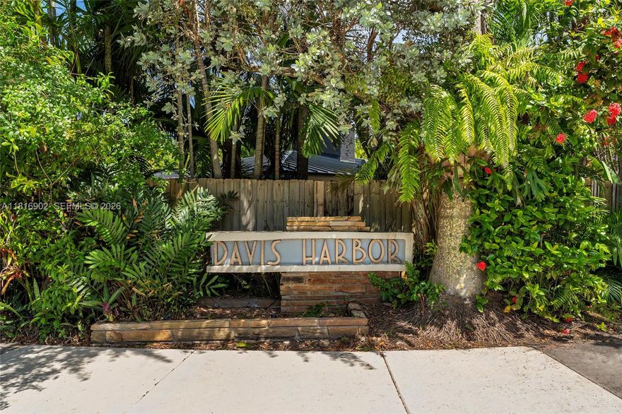 This rare waterfront oasis in Davis Harbor has been meticulously renovated to blend mid-century modern elegance w/ sophisticated luxury. Boasting 110 FT of prime waterfront on a 11,258 SF lot, this 5-BD/4.5-BA home is adorned w/ 4,000+ SF of Italian travertine floors, handmade cabinetry & stunning views of Biscayne Bay. A serene garden entry opens to a marble-clad living room w/ fireplace. The reimagined kitchen stuns w/ large marble island & Miele/Bosch appliances. An entertainer’s paradise, the sumptuous backyard features a resort-style pool, multiple outdoor lounge areas & built-in BBQ. Chic principal suite w/ direct outdoor access & a spa-like bathroom w/ rain shower, soaking tub & double-sinks. 4 additional BRs, 3 w/ ensuite baths, complete this one-of-a-kind bayfront offering.