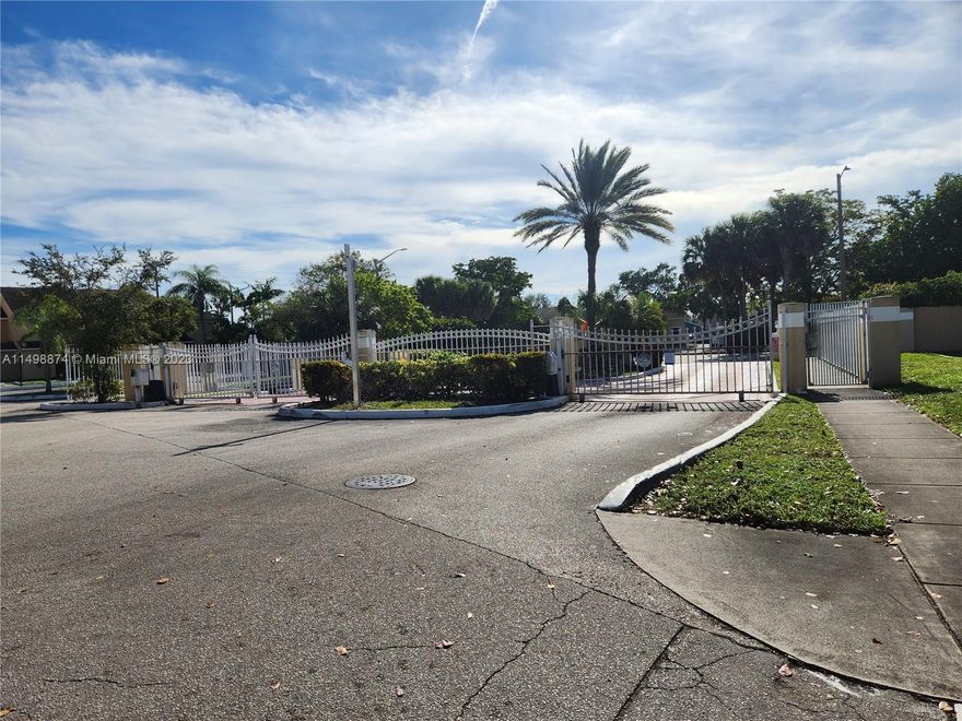 LARGE 2 BEDROOM TOWNHOSE IN GATED COMMUNITY.  HIGH VAULTED CEILINGS, FRESHLY PAINTED AND CLEANED.  LOCATED RIGHT OFF OF 27TH AVENUE.  MINUTES TO TURNPIKE, I95, MIAMI GARDENS, HALLANDALE, SHOPPING PLAZAS, RESTAURANTS AND MUCH MORE.  COMES WITH WASHER AND DRYER IN UNIT AND ASSIGNED PARKING SPACE.