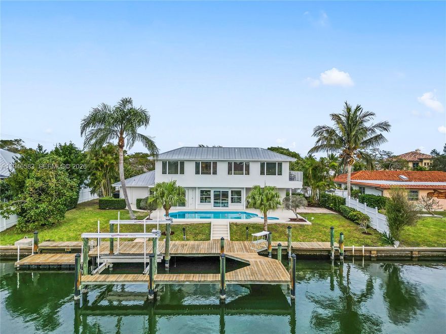 Welcome to 25 Park Avenue, a stunning waterfront home located on a deep water canal just an eighth of a mile from wide open intercoastal access. This beautifully renovated property offers open-concept living with all-new high-end finishes throughout. The spacious second-floor entertainment area includes a bar and breathtaking views of the water. Every detail has been carefully designed, including the complete renovation of the kitchen and all four bathrooms. Step outside to a private, expansive outdoor living space featuring a pool, spa, and an extra-large dock with two slips, davits, a lift, and an additional floating dock. Perfect for both relaxation and entertaining, this home offers ideal spaces for enjoying morning coffee or hosting sunset gatherings. Located in Vero Beach you'll experience the area's vibrant culture while enjoying the serenity of your own waterfront retreat. This home combines luxury, comfort, and the best of coastal living. Don't miss the opportunity to make this exceptional property your own!