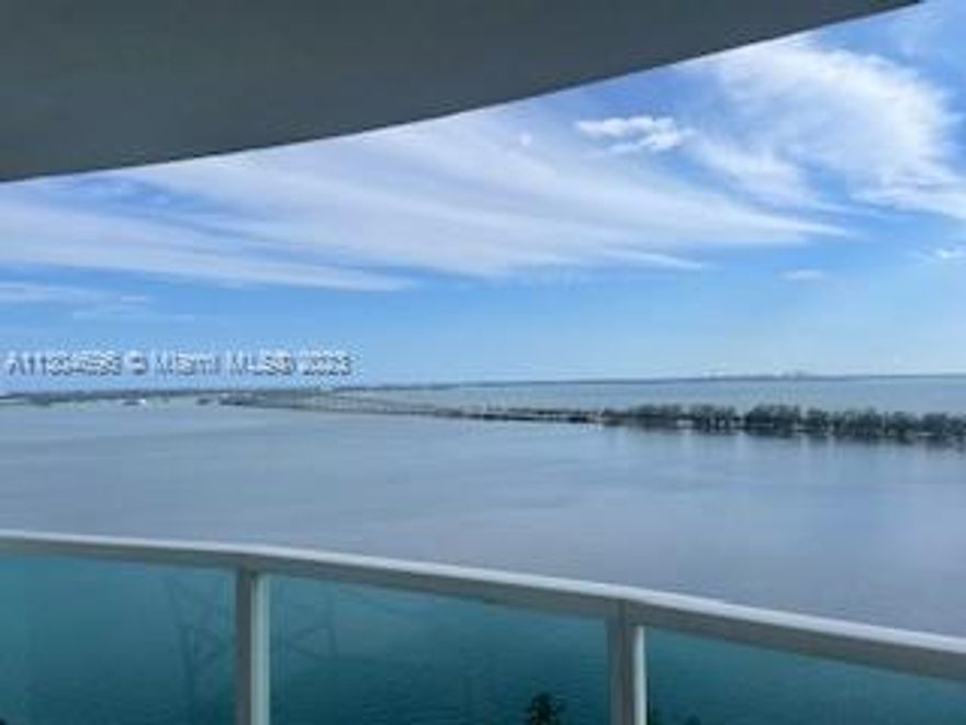 Direct and breathtaking bay front & ocean views from this 18th floor 2/2 corner spacious unit, floor-to-ceiling windows, high impact doors, open balcony, two covered assigned parking spaces and more! Full service building with 24-hr front desk, security, valet parking, marina, spa, sauna, fitness center, cafe/convenience store, BBQ area, tennis courts, party room and more! Brand new washer and dryer in unit.