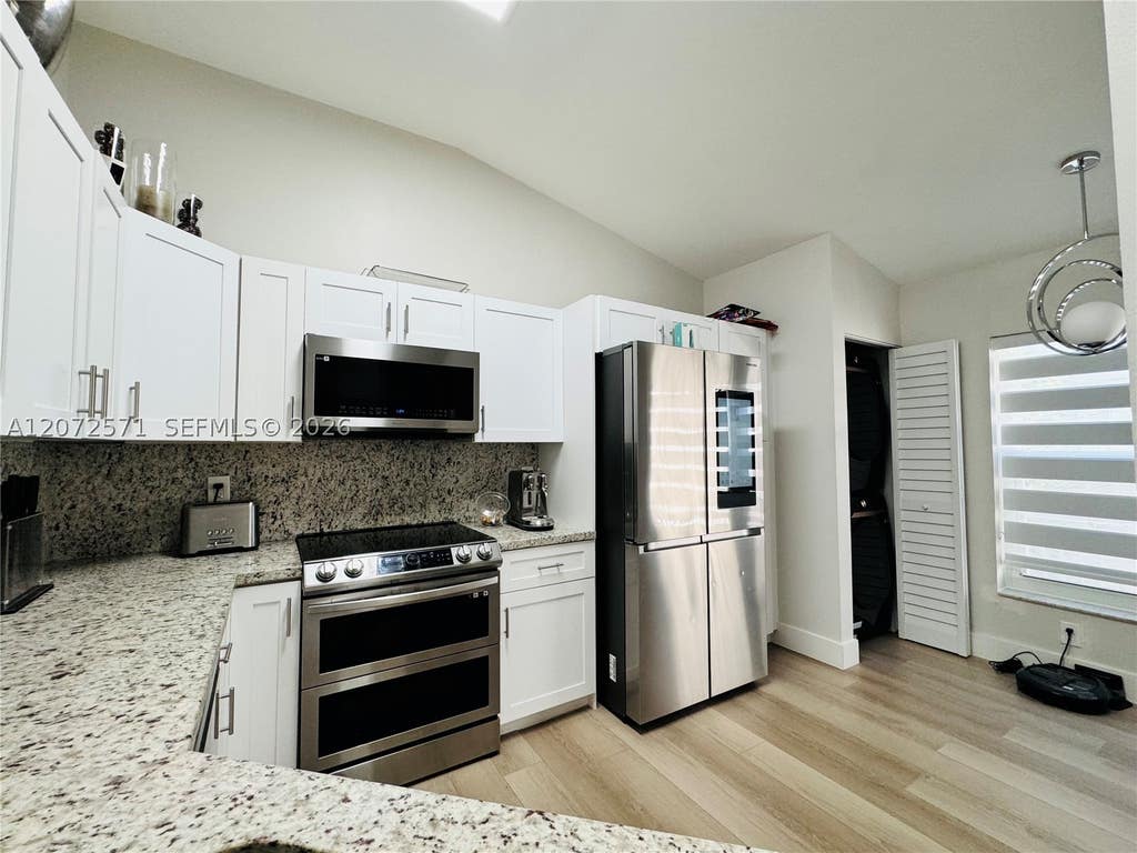 Photo of 1480 Sweetbay Way, Hollywood, FL 33019 (MLS # A12072571)
