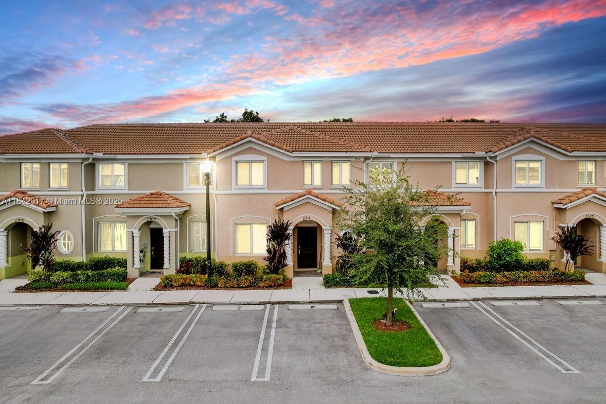 Fantastic investment opportunity! This stunning 4-bedroom, 3-bath home, built in 2021, is located in one of Homestead’s top gated communities, with a tenant in place until May 2026, paying $2,800 per month! Featuring an open-concept layout, this home includes a chef’s kitchen with stainless steel appliances, white quartz countertops, and modern cabinetry. The first floor offers a bedroom and full bath, perfect for guests or a home office. The spacious living area opens to a fenced patio, ideal for entertaining. Upgrades include ceramic tile flooring on the first floor. HOA benefits include basic cable, trash removal, two clubhouses, pools, a gym, playground, and dog park. Close to Baptist Hospital, shopping centers, and the Turnpike. Schedule your showing today!