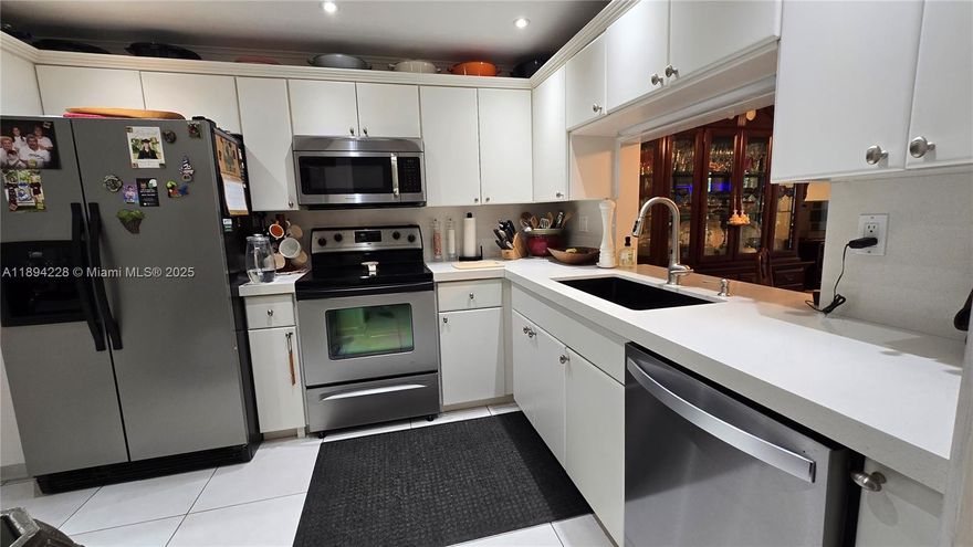 Welcome to your dream retreat in the heart of Pembroke Pines! This captivating, fully renovated 1 bed, 1.5 bath condo blends modern style with everyday comfort. Enjoy a bright, open layout and a chef’s kitchen featuring quartz countertops, stainless steel appl, & sleek cabinetry. Elegant large ceramic floors, updated baths, new screened balcony, impact windows, newer A/C, LG front-load washer/dryer add to the appeal. Furniture is negotiable! Live the good life at Colony Point, a vibrant 55+ resort-style community with clubhouse, gym, billiard room, theatre, heated pool, & walking trails. Maintenance includes cable, internet, water, security, & all amenities. Ideally located just 3 minutes from Pembroke Lakes Mall, fine dining, & great shops—this is the lifestyle you’ve been waiting for!