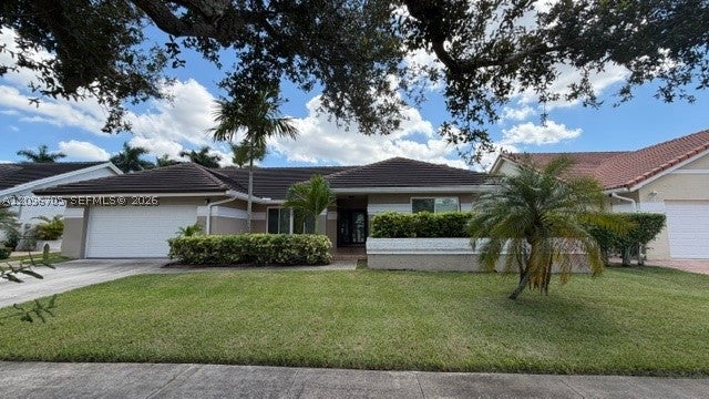 Photo of 16190 NW 14th St, Pembroke Pines, FL 33028 (MLS # A12096705)