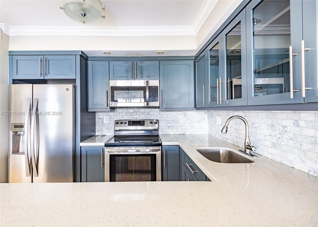 Photo of 600 Three Islands Blvd #402, Hallandale Beach, FL 33009 (MLS # A12010566)