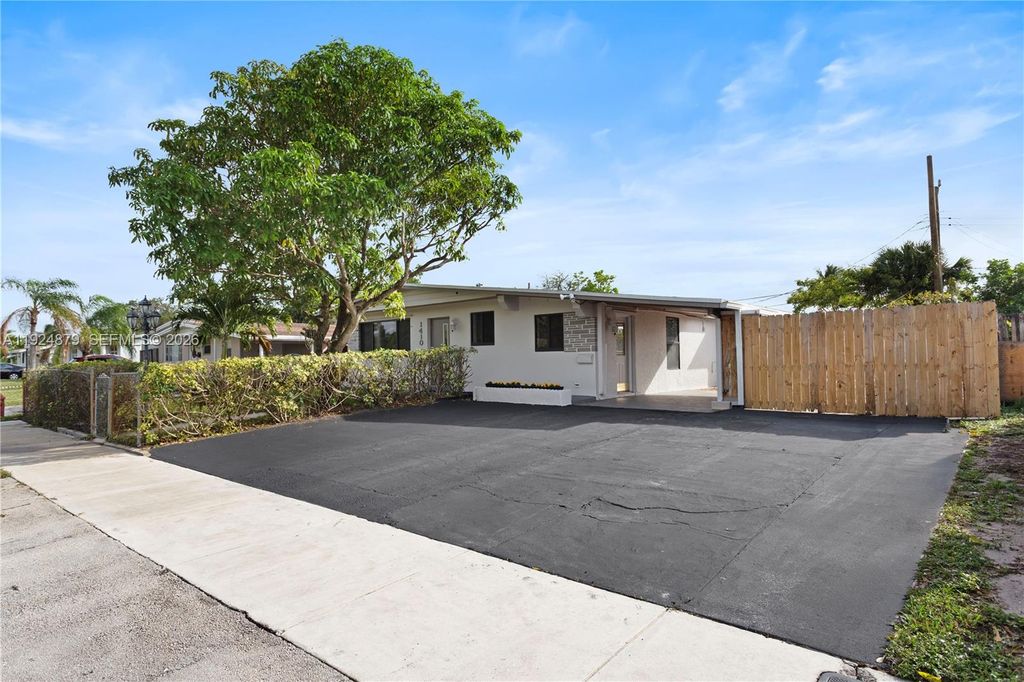 Photo of 1410 NW 42nd St, Fort Lauderdale, FL 33309 (MLS # A11924879)