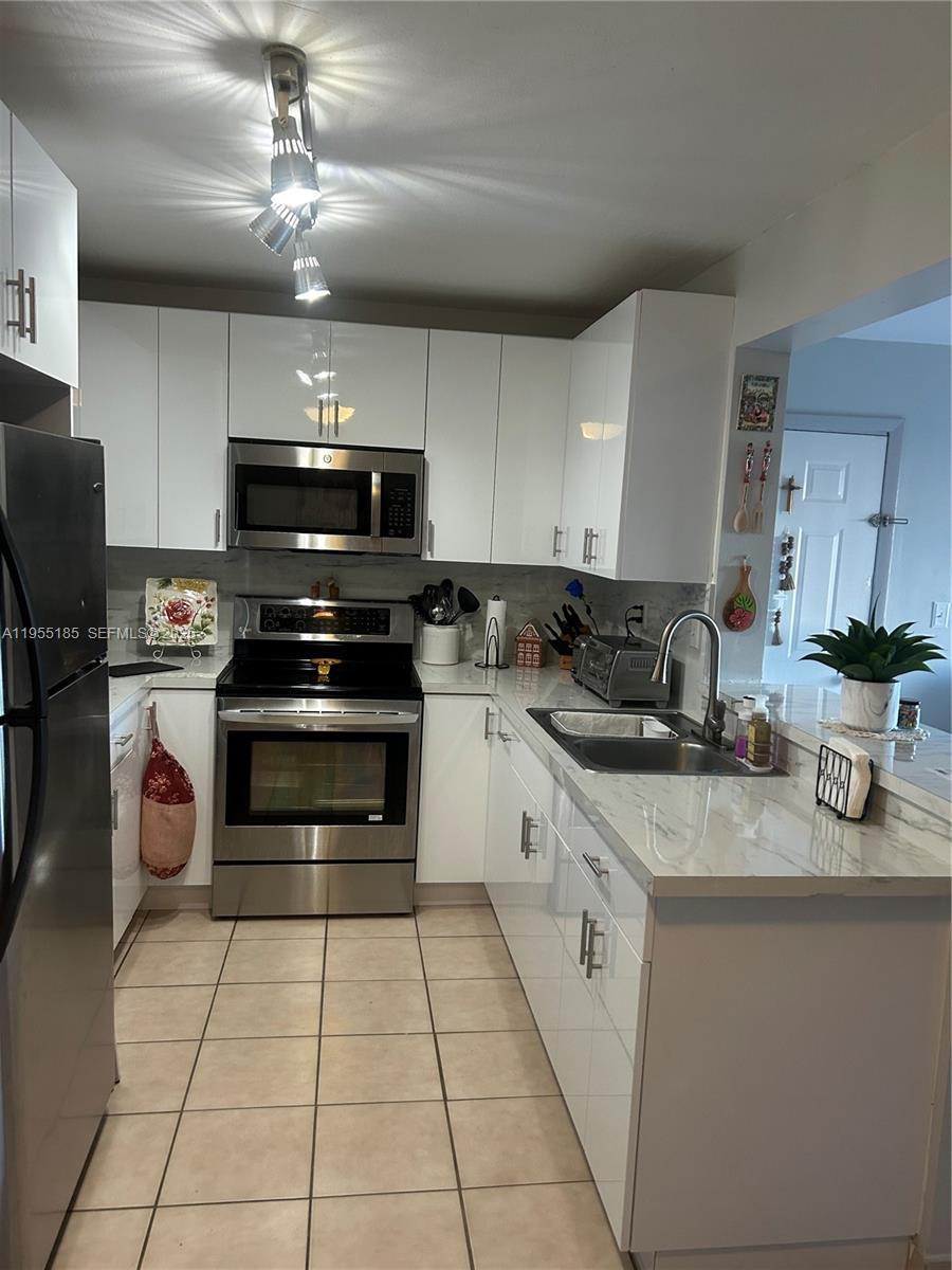 PALMS OF PEMBROKE CONDO - Residential