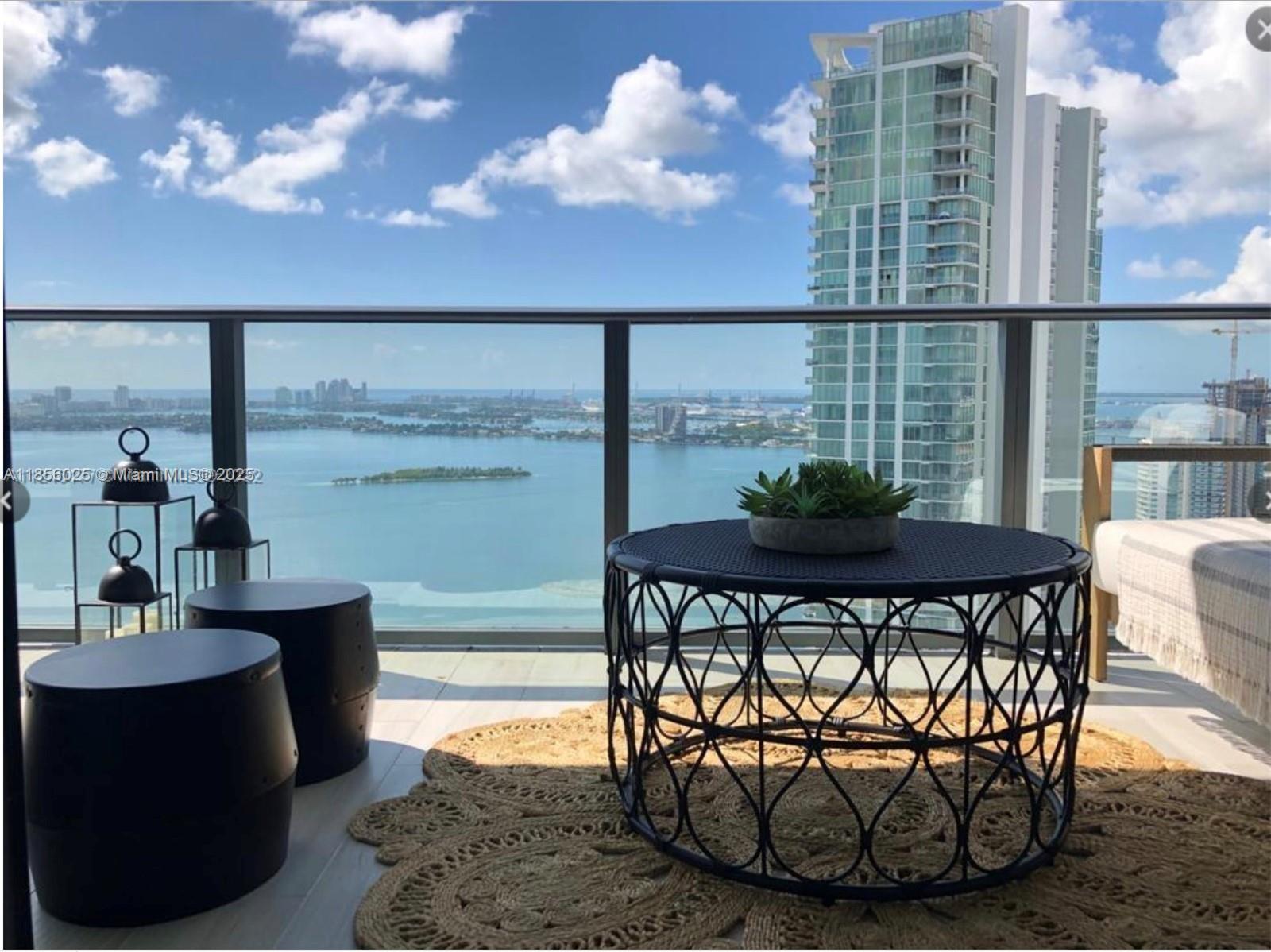 Luxurious high floor Big sgft 2 Bed+ Den/ 3 Bath at Paraiso Bay with endless direct views to Biscayne Bay up to the ocean, and the city skyline. Unit features great finishes of tile floors all throughout, California closets, blinds, European kitchen with top-of-the-line appliances, large terrace and private elevator. One assigned parking spots in best location and extra parking with Valet. Best resort style amenities: 100 ft Infiniti pool, residents lounge, cigar lounge, wine tasting room, two tennis courts, outdoor grill, bay front park and marina w/watersports, state-of-the art gym and SPA, movie theater, bowling alley, kid’s play & games rooms, AMARA Restaurant by Chef Michael Schwartz.