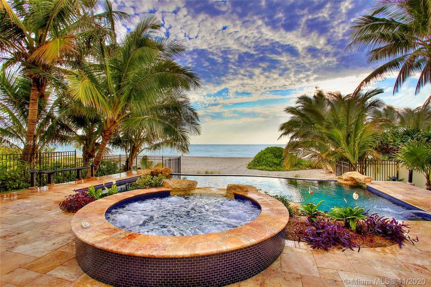 In the coveted oceanfront community of Golden Beach lies a villa filled with sunshine, the Atlantic & seclusion. The beachfront gated estate provides a tropical lifestyle all within the confines of the property. Soak up vitamin D, reduce stress, & enjoy your own natural fitness center. The sea air is shown to help aid a better night’s sleep while boosting your immune system. Enjoy panoramic views of the ocean from the 3 BR home built in 2008 w/ detached spacious air-conditioned garage. Your picturesque backyard has a steamy hot tub for your R&R & a saltwater infinity pool built over the beach that overlooks the pristine white sand.Equipped to entertain w/ outdoor kitchen, TV & shower. Few hundred yards walking distance to restaurants on beach! Private police force - 17 full time & 5 part.