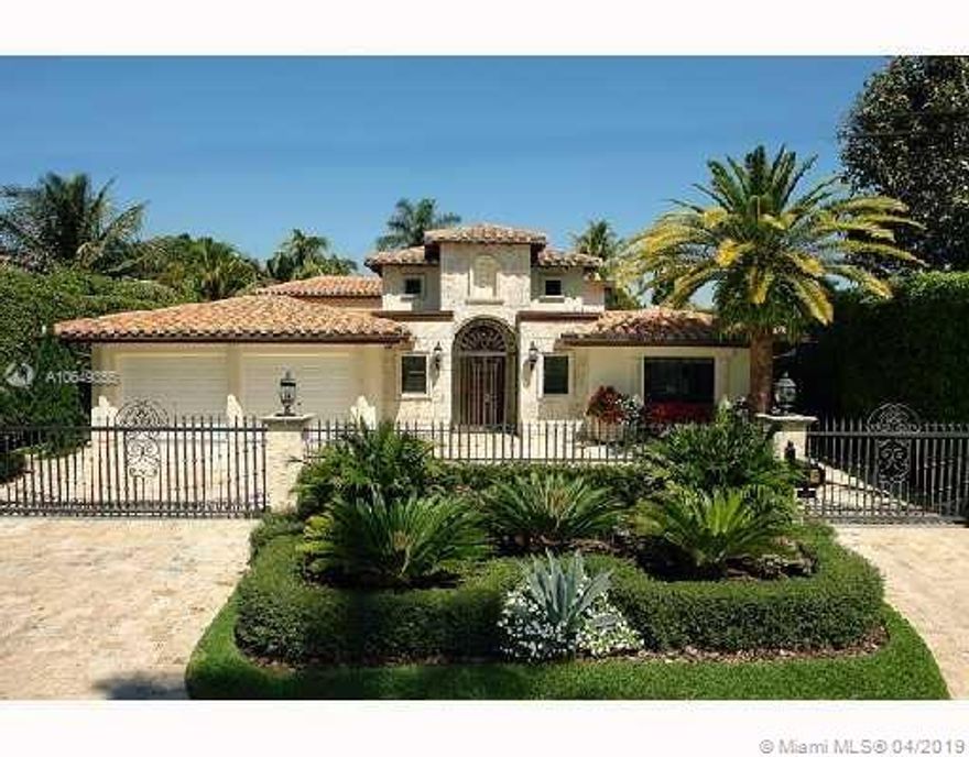 Renovated waterfront home on gated Sunset Island IV. Amazing finishes throughout. Arched mahogany doors, vaulted ceilings, Saturnia floors w/inlaid mosaic, combined formal living & dining area with spectacular view, gourmet kitchen with granite countertops. The 2nd level includes an intimate guest suite w/terrace and luxurious master suite. Great pool area surrounded by an English garden, pool cabana bath, summer kitchen & large dock w/lift. Maids quarters, laundry room. 75' of waterfront.