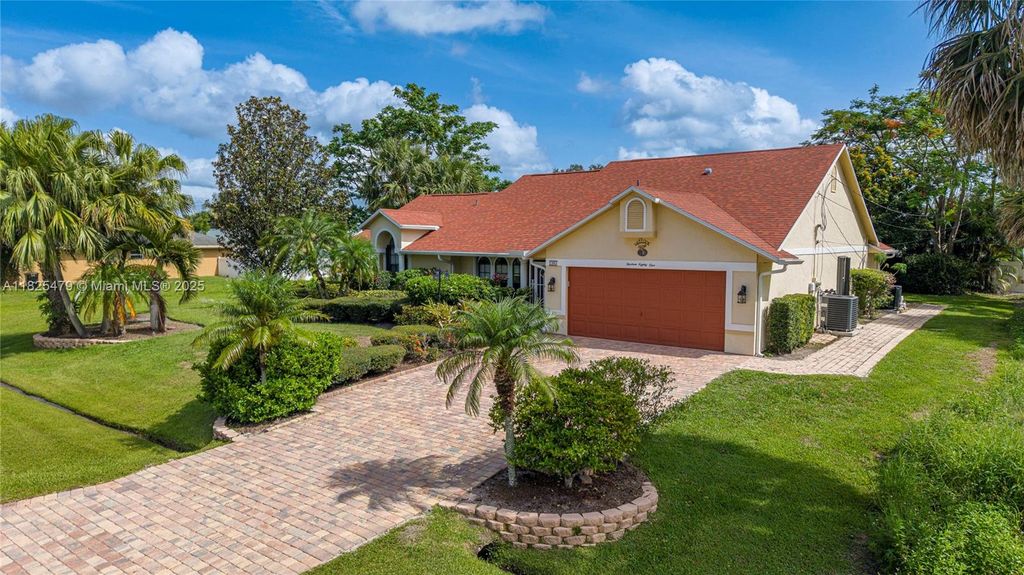 Photo of 1381 SW Leisure Ln, Port St Lucie, FL 34953 (MLS # A11825479)