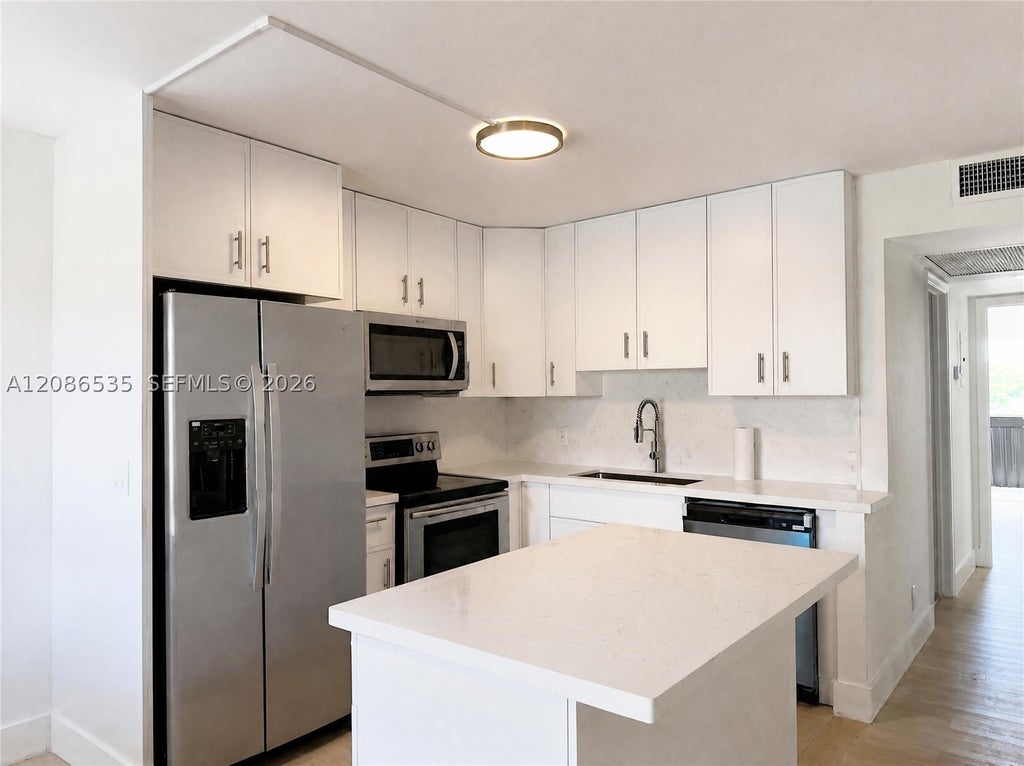 Photo of 13475 SW 9th St #302A, Pembroke Pines, FL 33027 (MLS # A12086535)