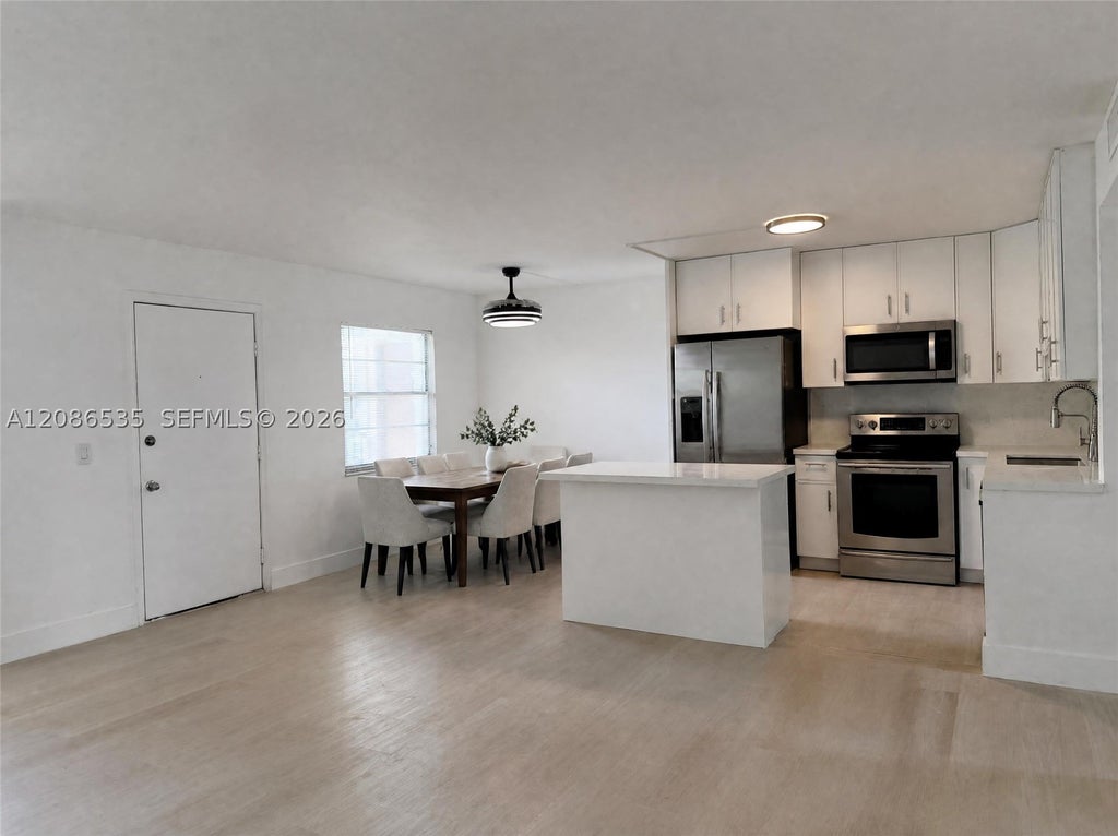 Photo of 13475 SW 9th St #302A, Pembroke Pines, FL 33027 (MLS # A12086535)